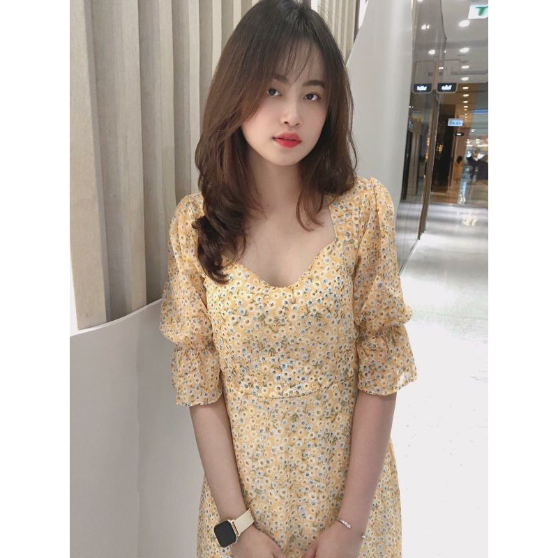 Đầm hoa vàng nhạt, chất liệu voan, nhẹ nhàng thoải mái