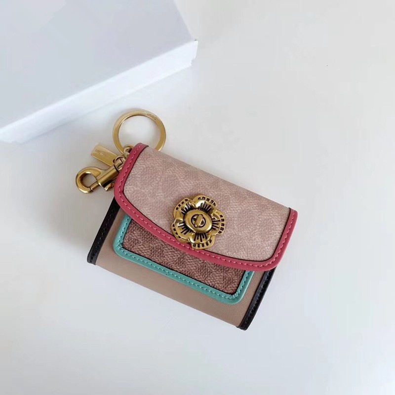 charm ví coach mini cực tiện lợi