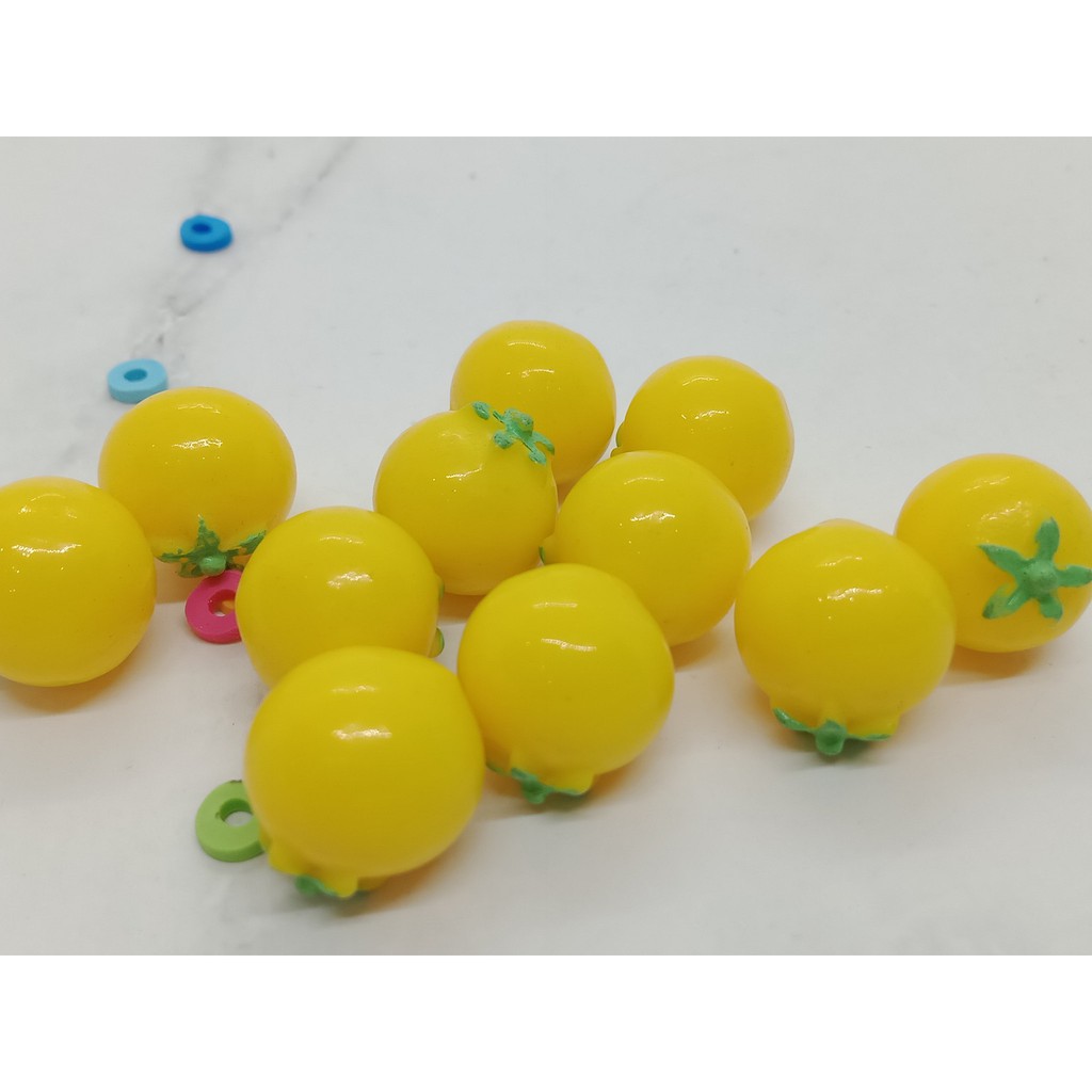 Charm quả cà chua vàng
