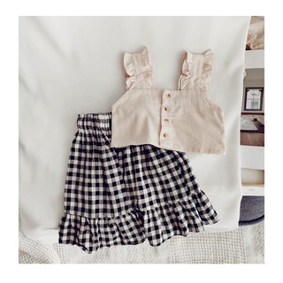 Áo croptop hai dây phối chân váy xòe karo cho bé