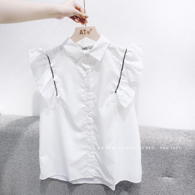 Sơ mi trắng cánh tiên chạy viền đen