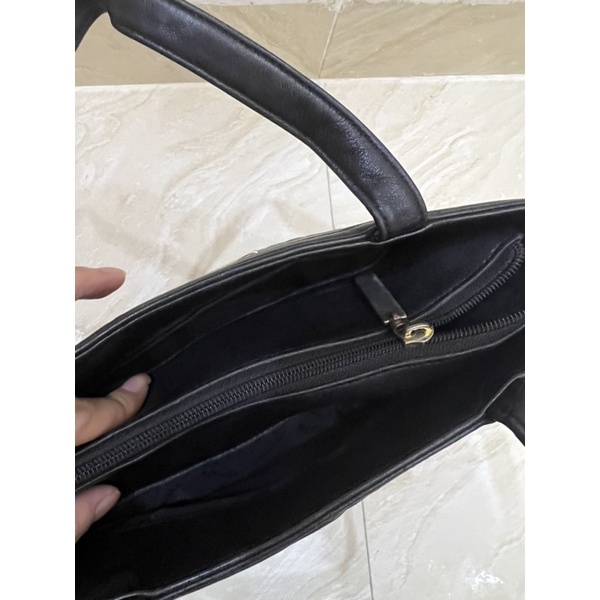 Túi si hiệu da thật