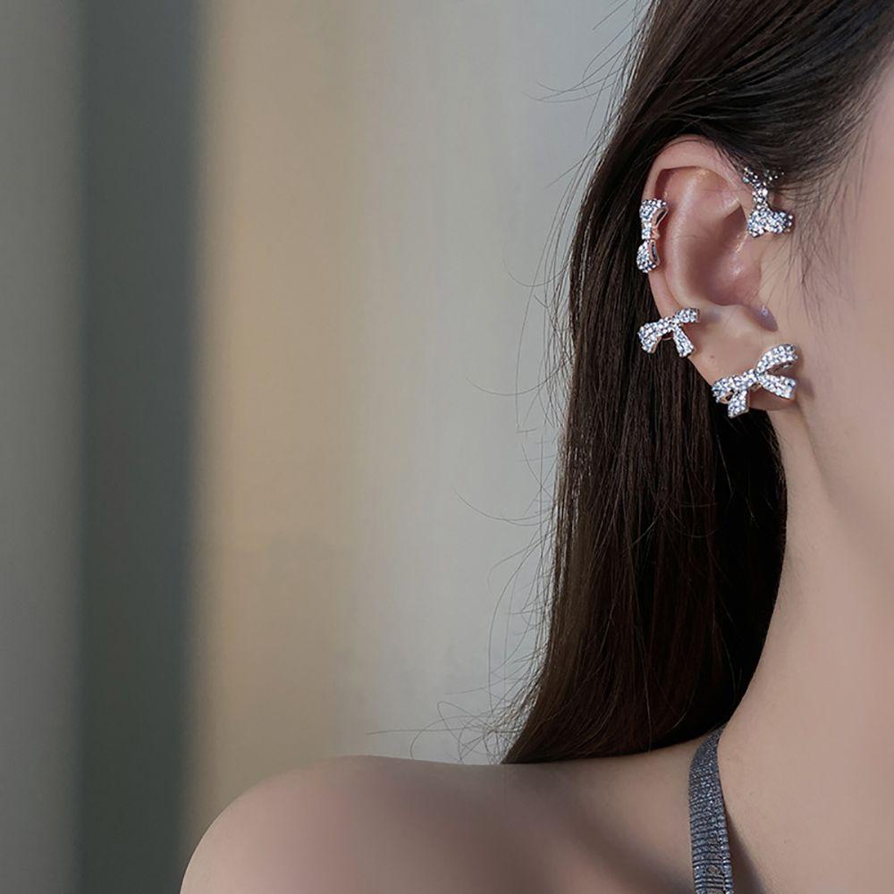 1 Khuyên Kẹp Vành Tai Hình Nơ Bằng Kim Loại Lấp Lánh Phong Cách Hàn Quốc Cho Nữ MXMUSTY