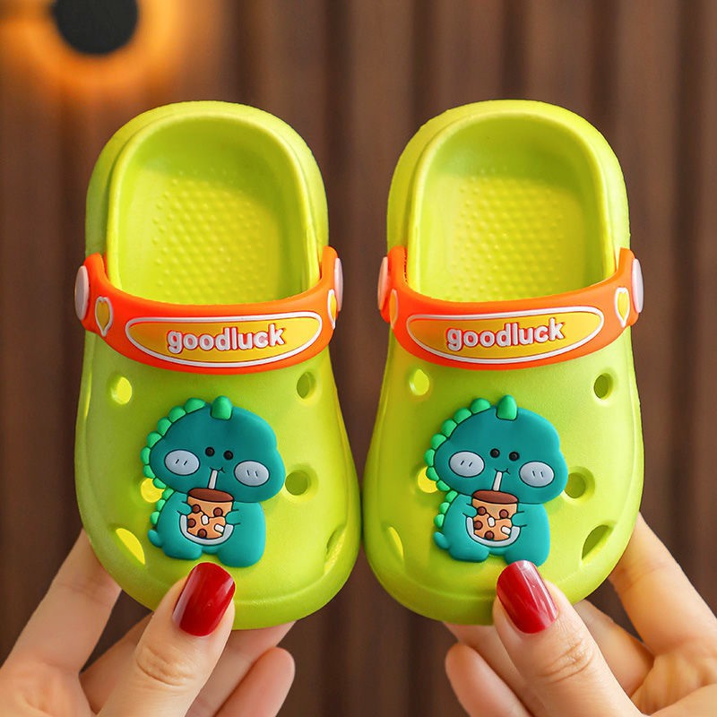 Giày sục cao su mềm tặng kèm sticker cho bé trai và bé gái hình khủng long