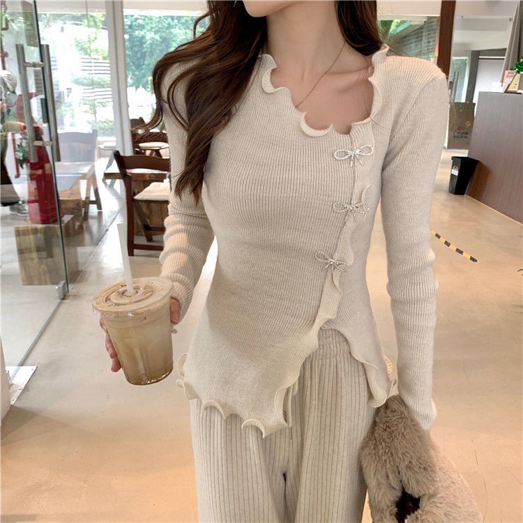 Áo len nữ cổ chữ v phối nơ thời trang