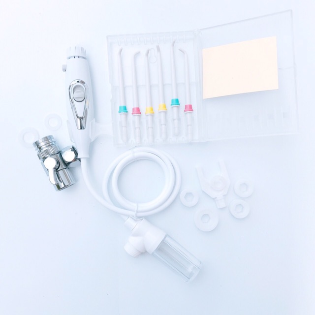 Máy Tăm nước cơ gắn vòi rửa mặt X4