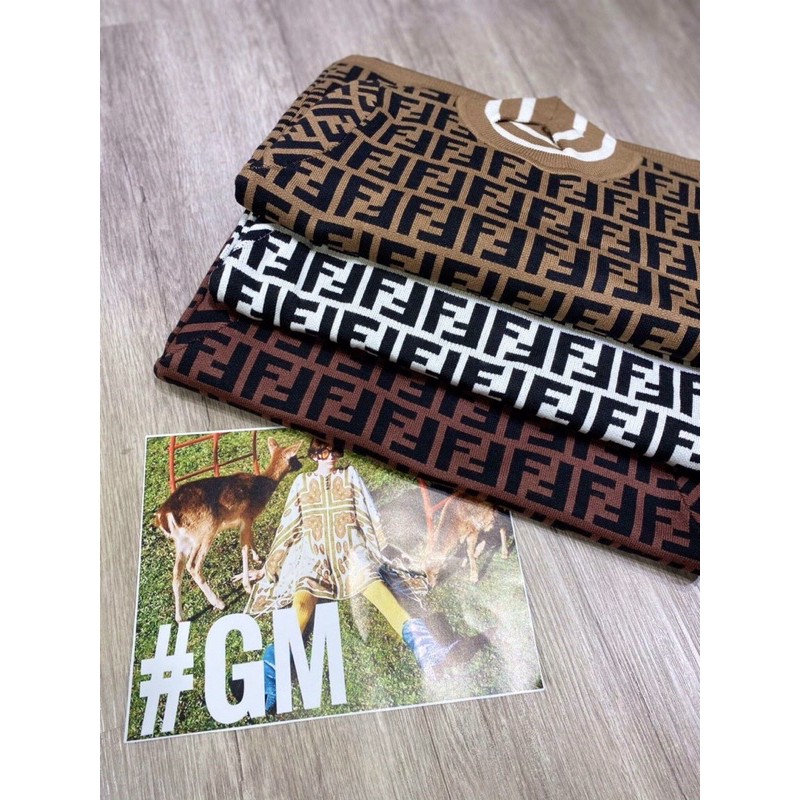 Đầm len body cổ cao viền trắng