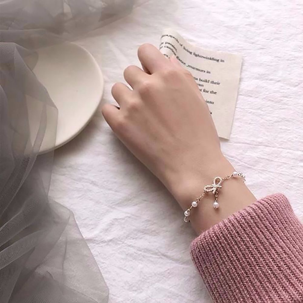 Vòng Tay Hình Nơ Đính Ngọc Trai Bằng Hợp Kim Phong Cách Hàn Quốc Thời Trang Dành Cho Nữ