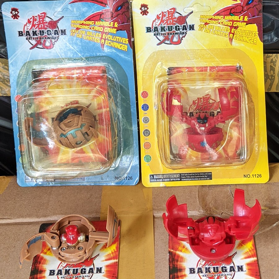 Bộ 2 đồ chơi bakugan gồm thẻ bài như hình. Bakugan2.