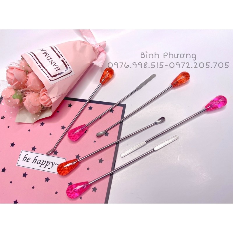 Que múc khuấy mực