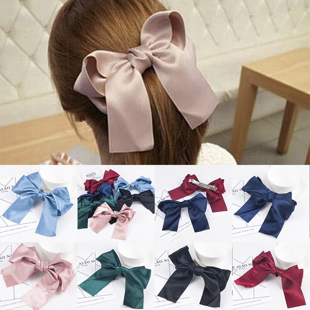 Kẹp tóc nơ màu trơn thời trang xinh xắn cho nữ