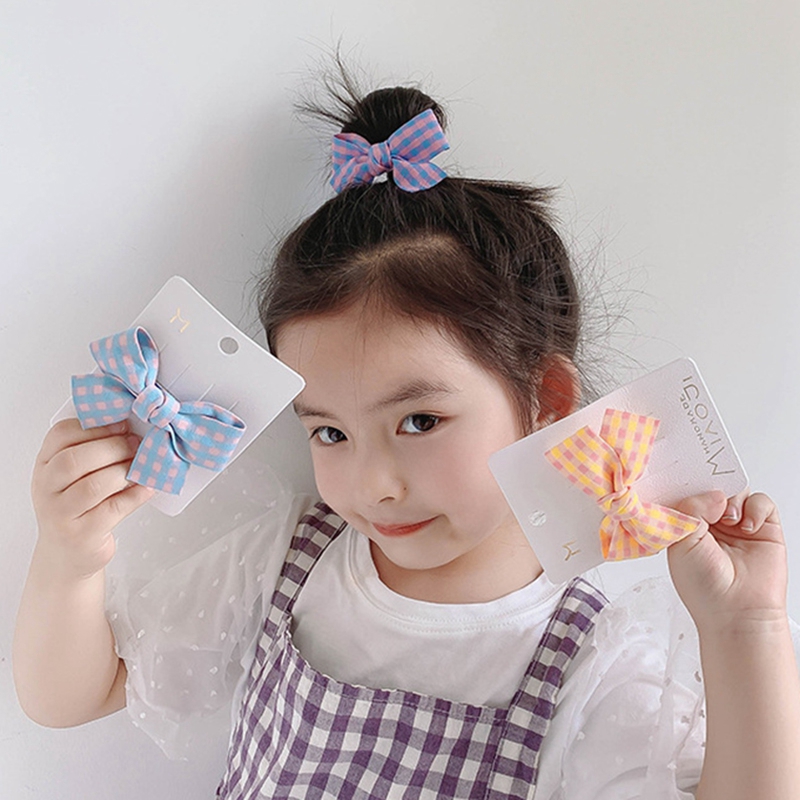 Kẹp tóc đính nơ họa tiết nhiều màu phối kim loại an toàn dành cho bé