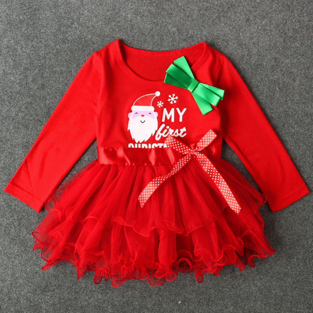 Đầm bé gái in hình ông già Noel