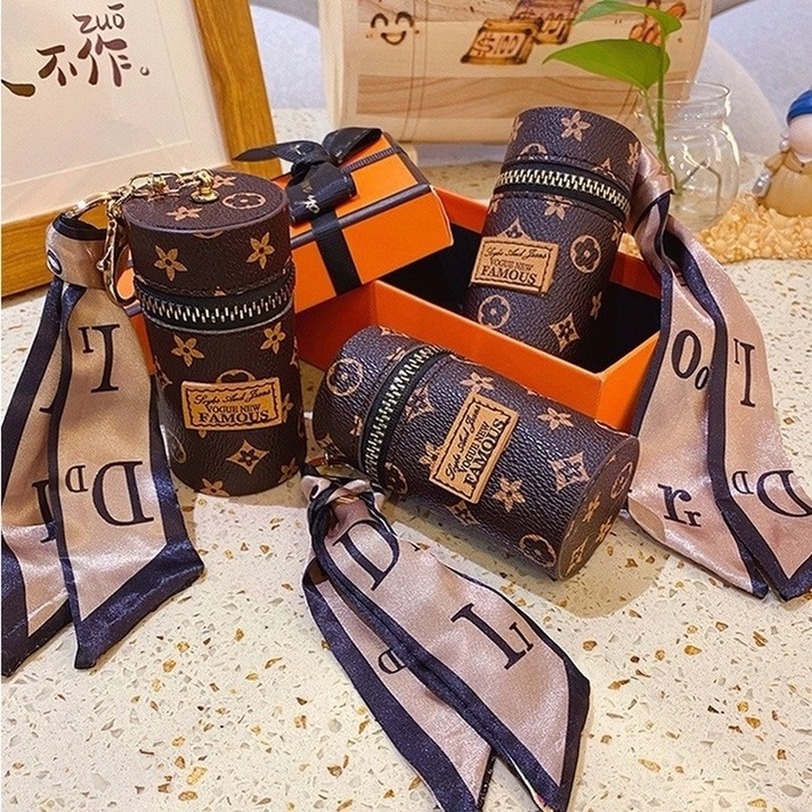 Móc Khóa Hình Minion Đeo Túi Xách Bằng Lụa Sáng Tạo Cho Nữ