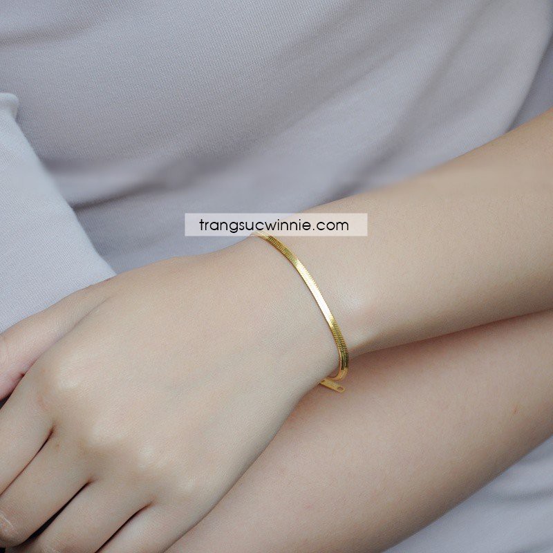 Lắc tay nữ titan ck vàng gold