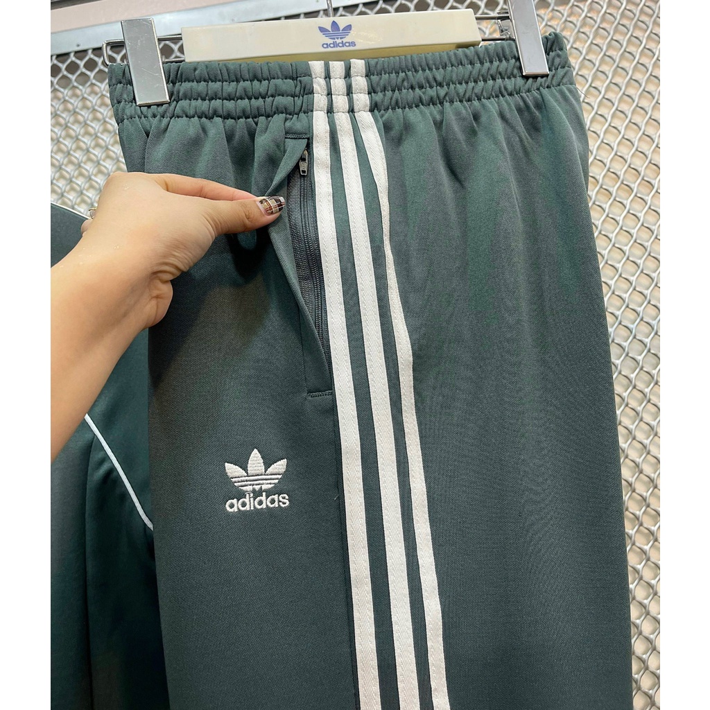 Bộ Quần Áo Thể Thao Unisex Nam Nữ Adidas SST Track Màu Xi Măng