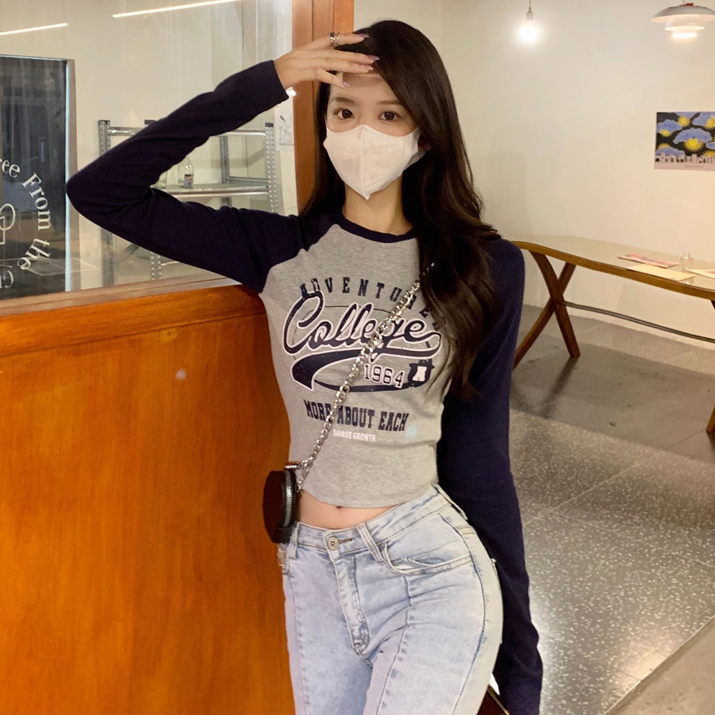 Áo thun tay dài in họa tiết màu sắc tương phản đầy phong cách cho nữ