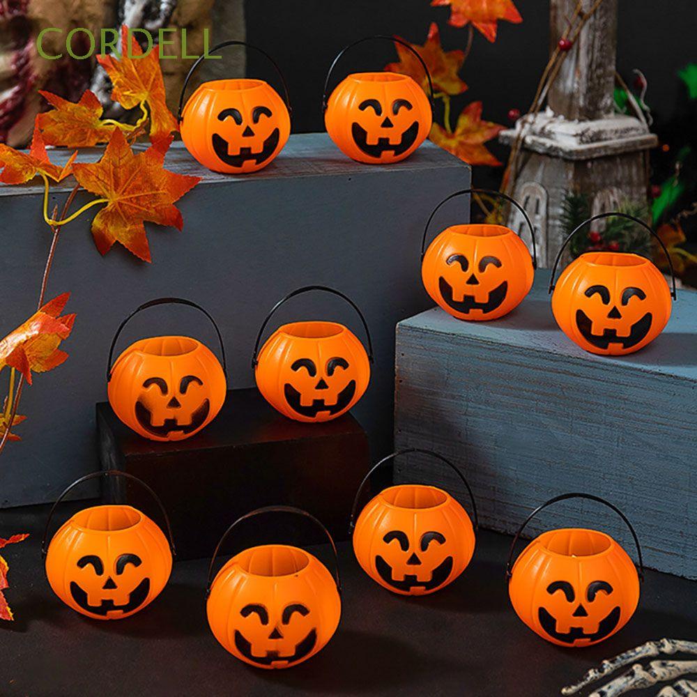 Set 2 Hộp Đựng Kẹo Hình Quả Bí Ngô Mặt Cười Có Tay Cầm Dùng Làm Quà Tặng Halloween Cho Bé