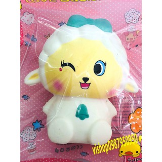 Squishy cố gái cừu trắng đeo nơ cười