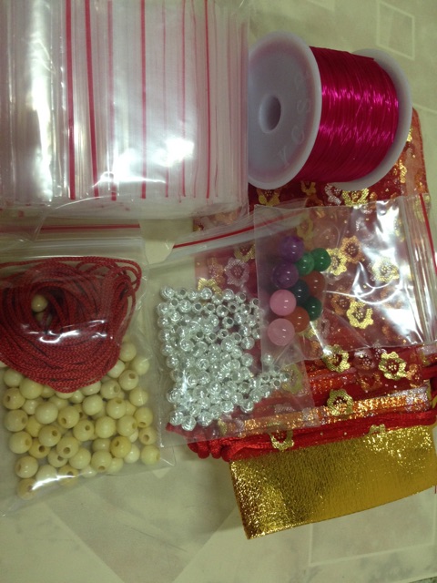 Combo 100hat dâu + 10( bi bạc, tui zip, đá, túi lộc, cước lụa, dây dù)