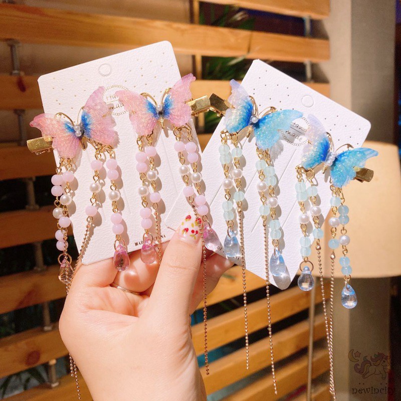 Kẹp tóc phối tua rua phong cách cổ điển cho bé gái