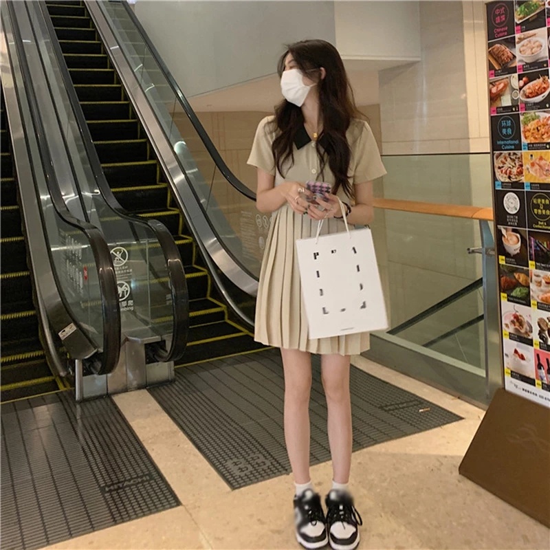 Đầm polo nữ HB thiết kế cổ phối màu đen tùng váy xếp ly D059 | BigBuy360 - bigbuy360.vn