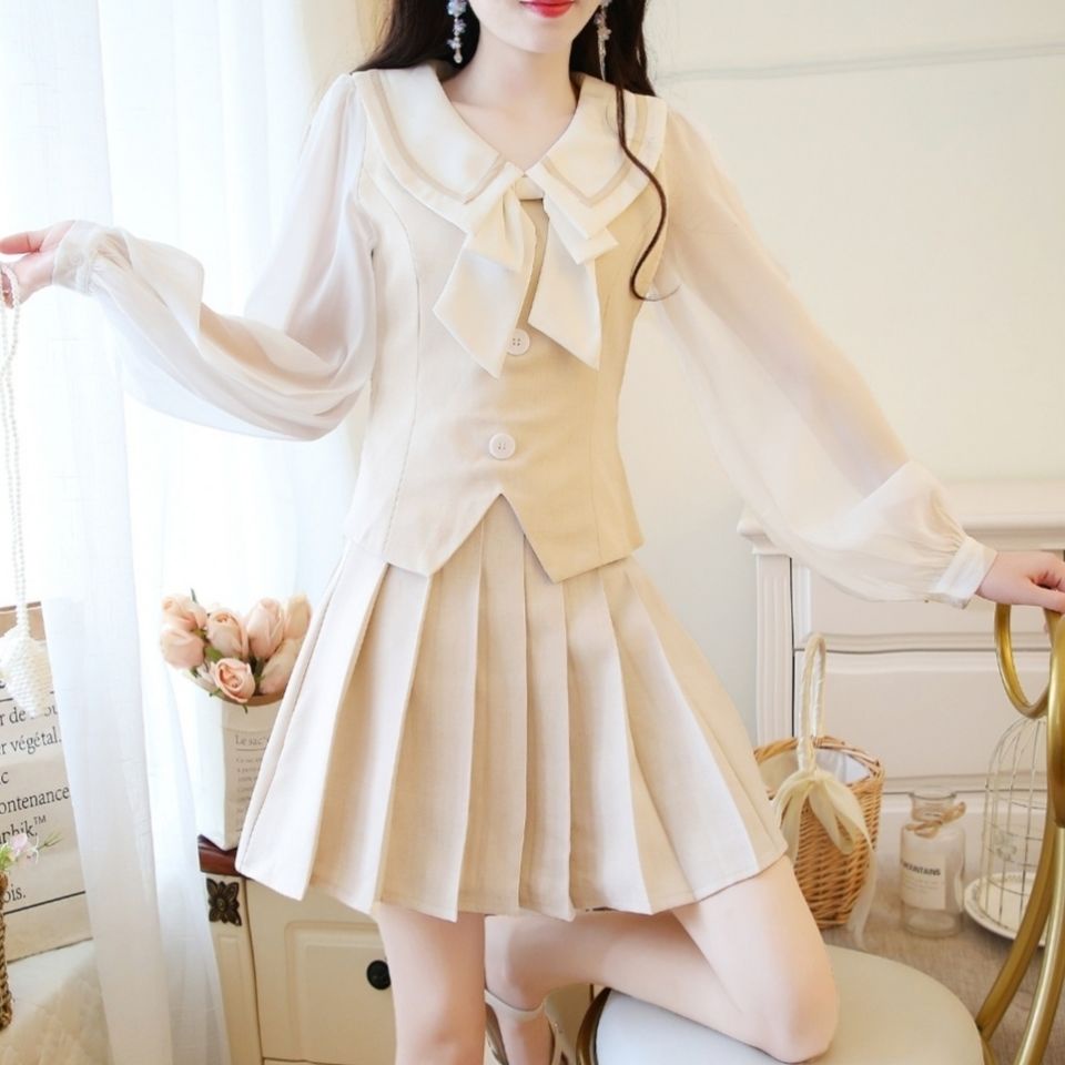 Bộ áo voan phối chân váy xếp ly đáng yêu cho nữ