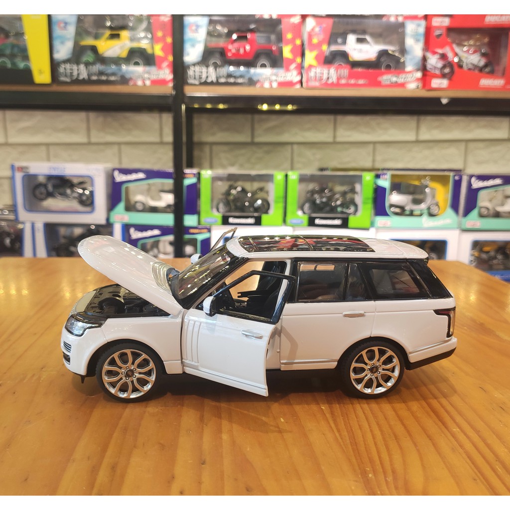 Mô hình xe ô tô trưng bày Range Rover Land Rover hãng Rastar tỉ lệ 1:24 màu trắng