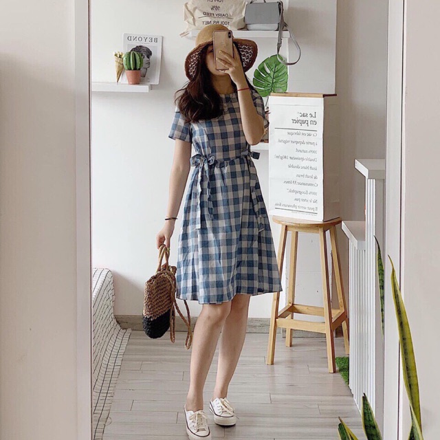 Đầm caro nơ eo .