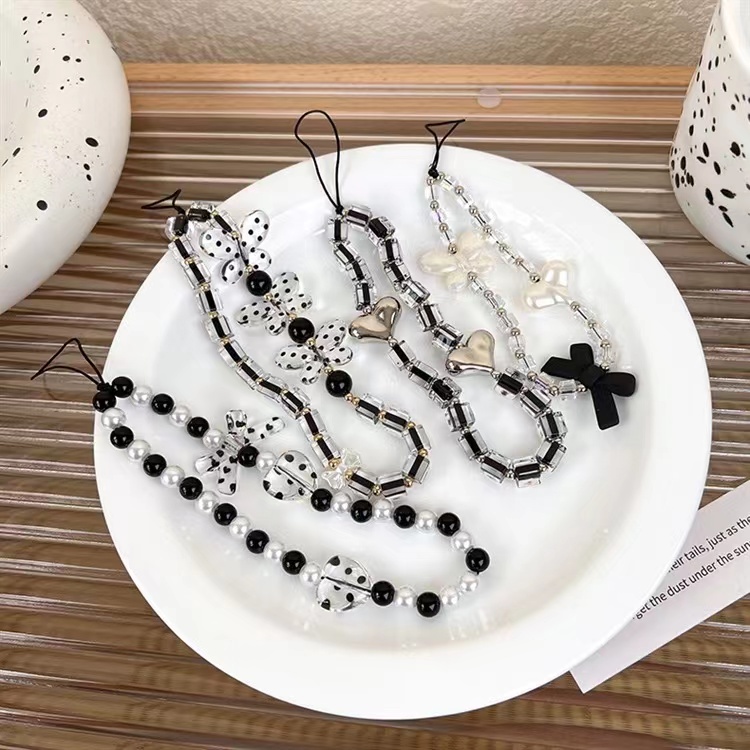 Dây Đeo Điện Thoại Xâu Hạt Tròn Chấm Bi Trắng Đen Chống Thất Lạc