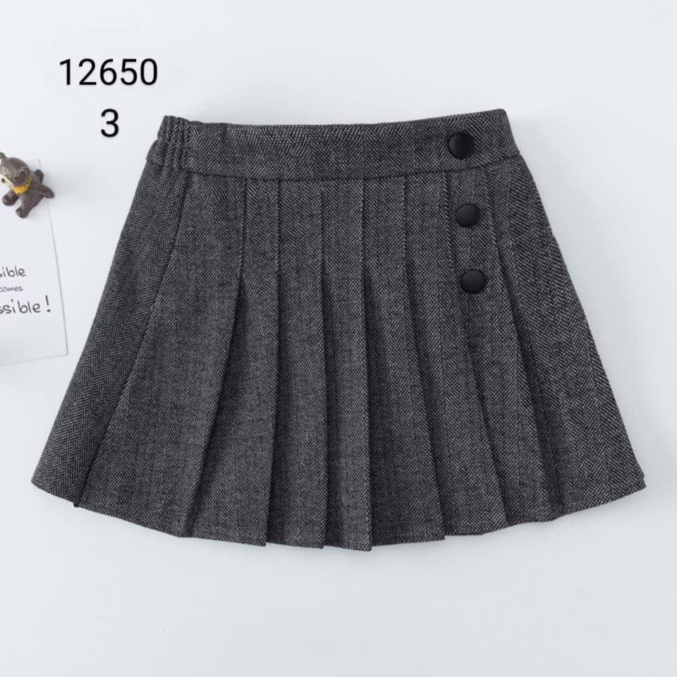 Chân váy dạ xếp ly có may liền quần bên trong bé gái TQXK size 110-160 cm