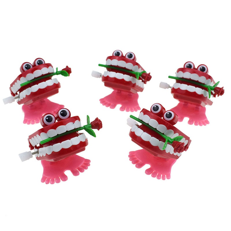 Đồ chơi lên dây cót hình hàm răng dễ thương cho bé