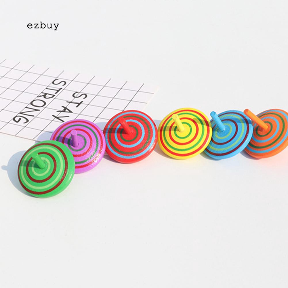 Con quay đồ chơi bằng gỗ nhiều màu sắc giúp giảm căng thẳng