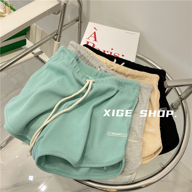 Quần đùi thể thao ống rộng màu trơn xinh xắn dễ phối đồ dành cho nữ