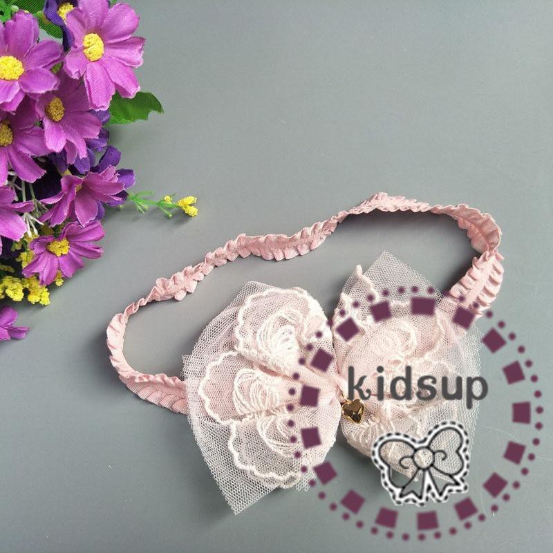 Băng đô dành cho bé gái tập đi gắn hoa