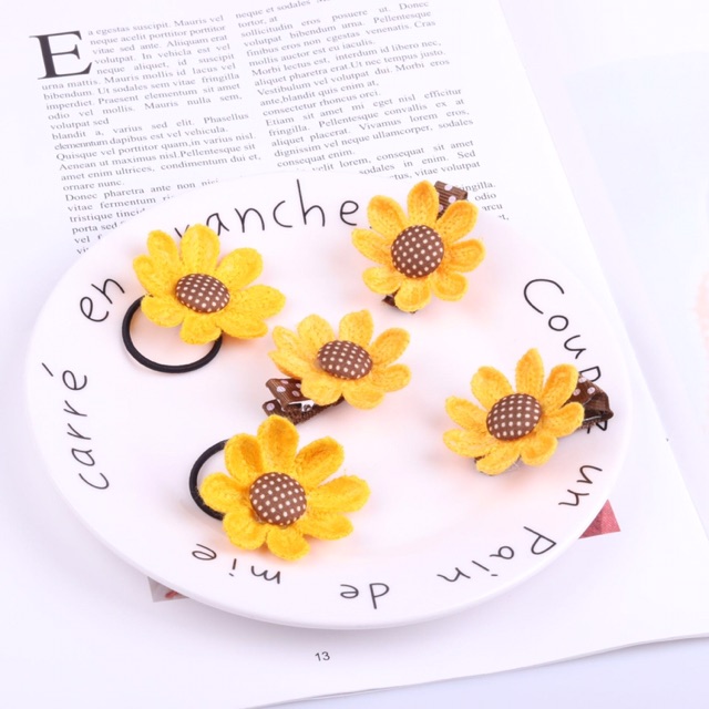 Sỉ 10 buộc tóc hình hoa len đan 53k