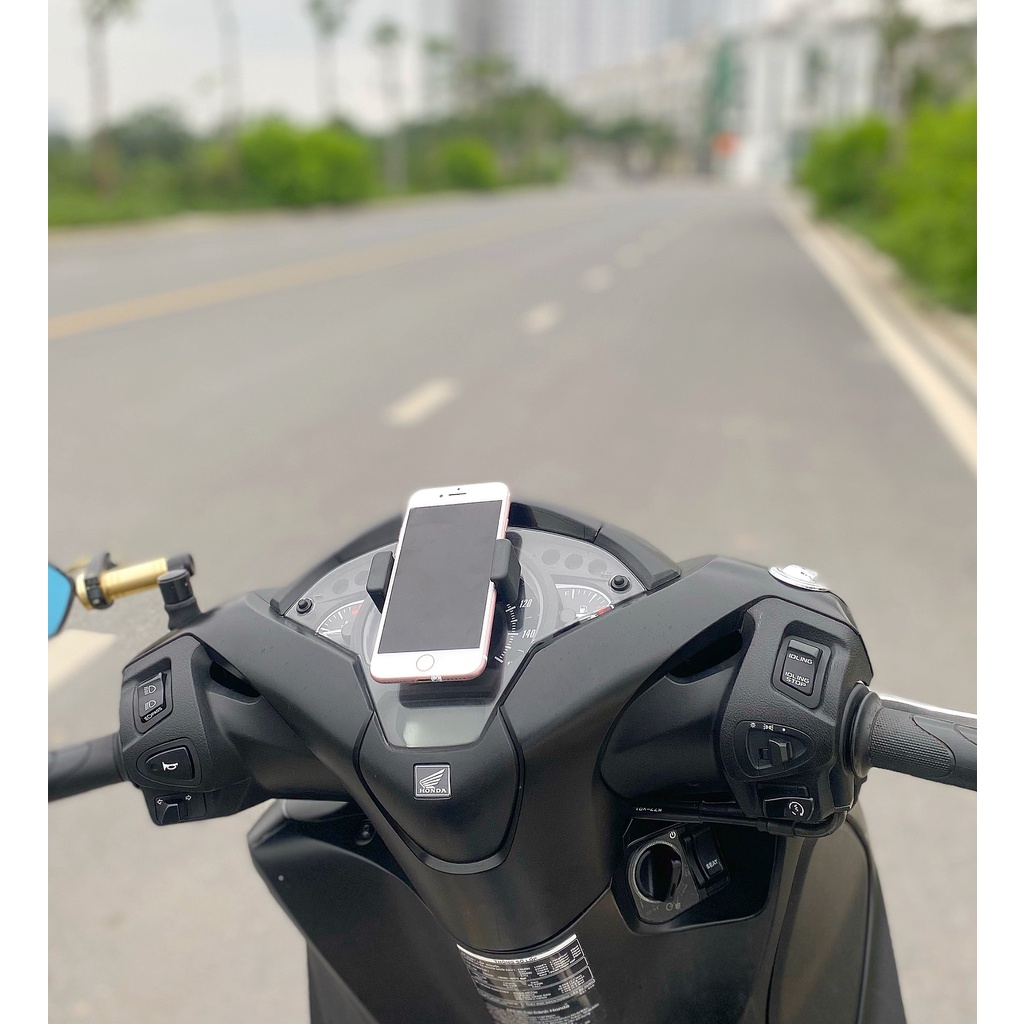 Kẹp điện thoại - Giá đỡ điện thoại dán lên đồng hồ xe máy