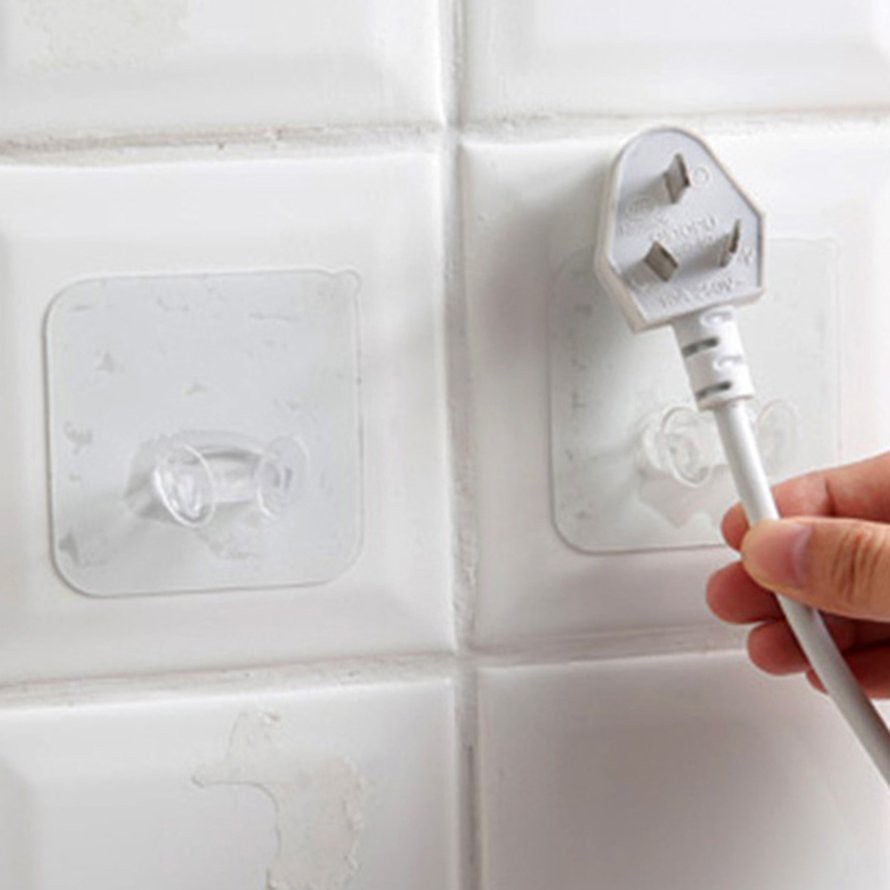 Móc Dán Tường Treo Phích Cắm Điện Trong Suốt Tiện Dụng