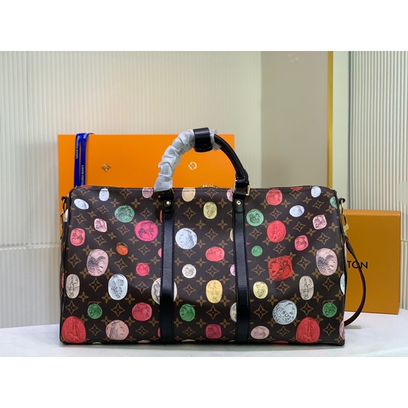 Túi du lịch dáng trống thương hiệu Louis Vuitton LV da thật cao cấp họa tiết đồng xu