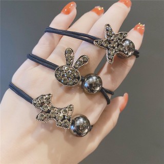 cột tóc đính đá đen các kiểu