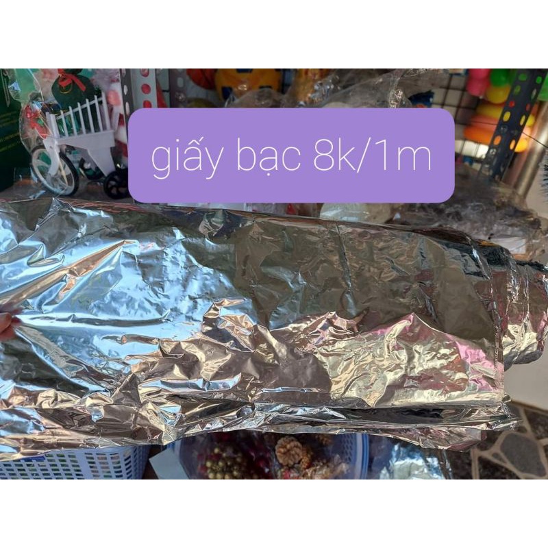 Giấy bạc làm hang đá Giáng Sinh