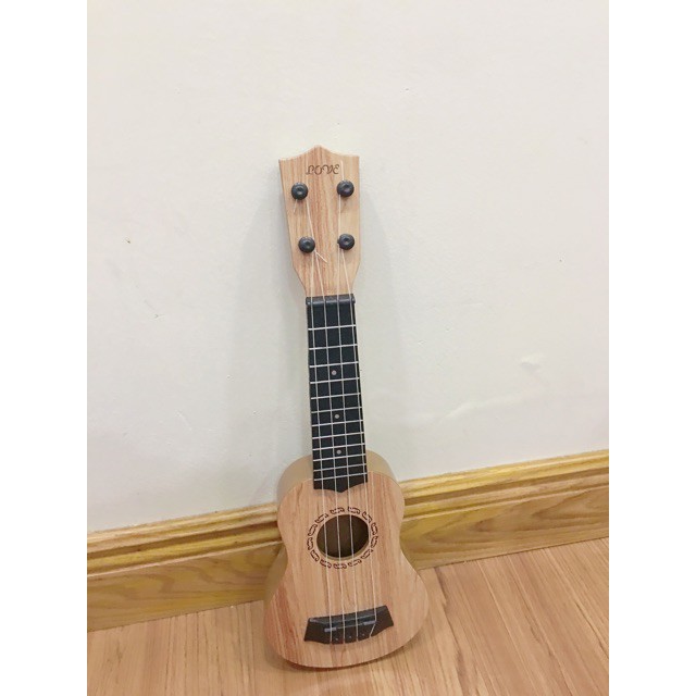 siêu hót Đàn Ukulele Nhựa Cho Bé - Đàn Ghi Ta Mini DTE