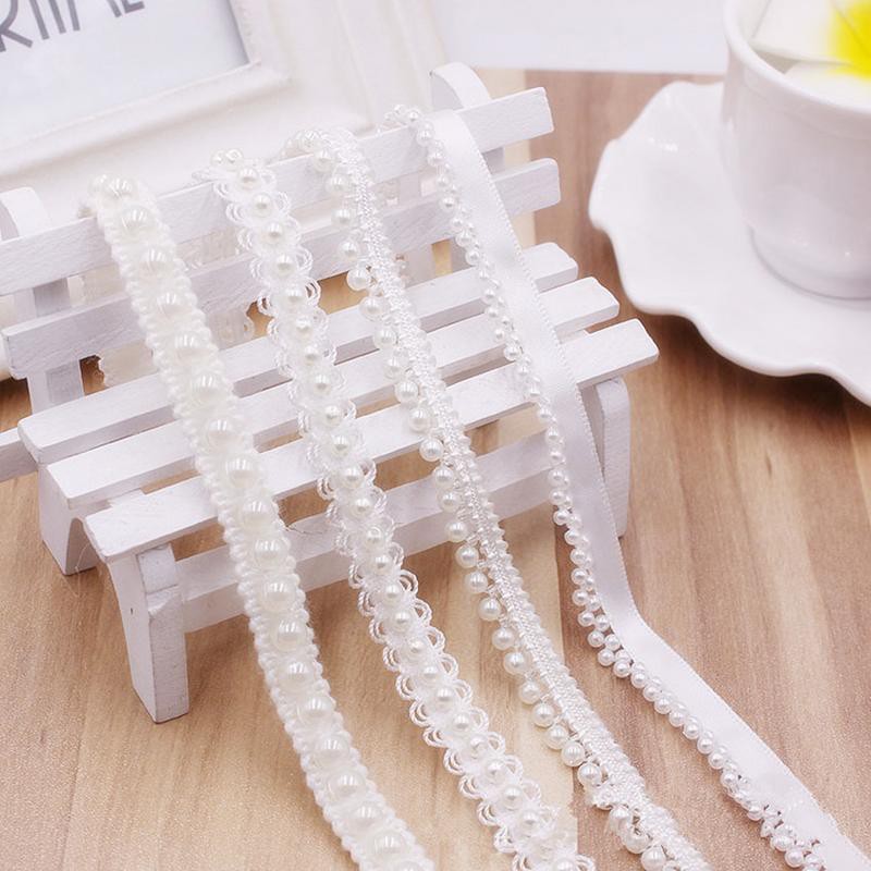 Dải dây ren trắng đính ngọc trai