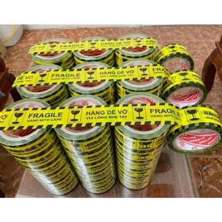 1 cuộn băng keo in chữ " hàng dễ vỡ "