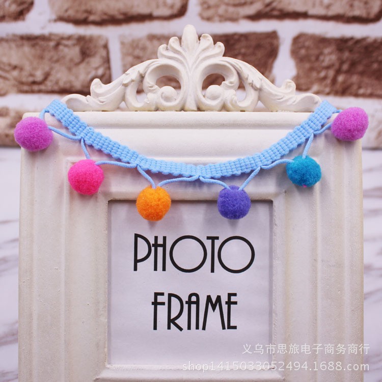Dây tua rua gắn quả pom pom xinh xắn dùng trang trí tiện dụng