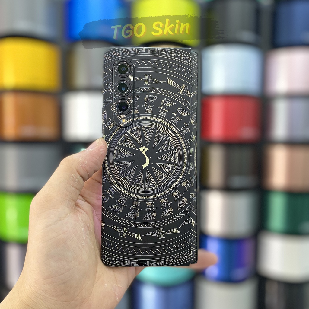 Miếng dán Skin trống đồng iPhone 14 Pro Max / 13 Pro Max / 12 Pro Max / 11 Pro Max / Xs Max / 8 Plus in UV cao cấp