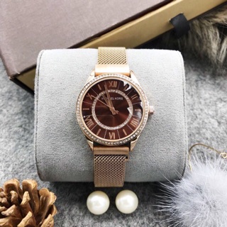 Đồng hồ dây lưới nút hít nam châm