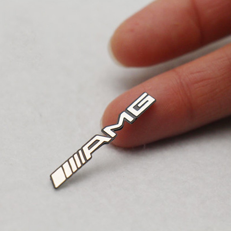 Set 2 logo AMG dán vô lăng xe hơi Mercedes