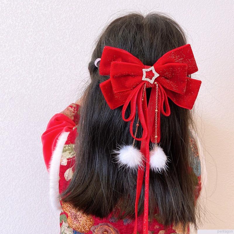 Kẹp tóc mặt nơ tua rua màu đỏ xinh xắn dành cho nữ vào tiệc giáng sinh năm mới