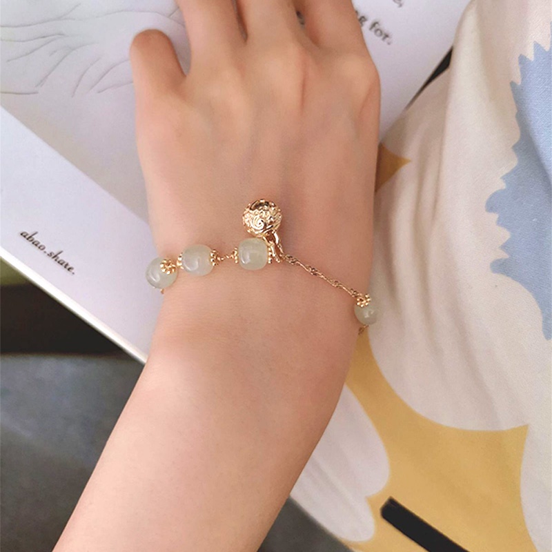 Vòng tay chuỗi đính ngọc trai họa tiết hello kitty thời trang retro chất lượng dành cho nữ